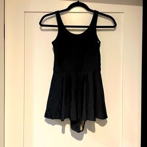 Kortni Jeane skirted one piece swimsuit